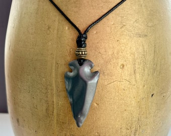 Arrowhead pendant necklace with a antique bronze bead and an adjustable black cord, boho jewellery, spearhead arrow head choker