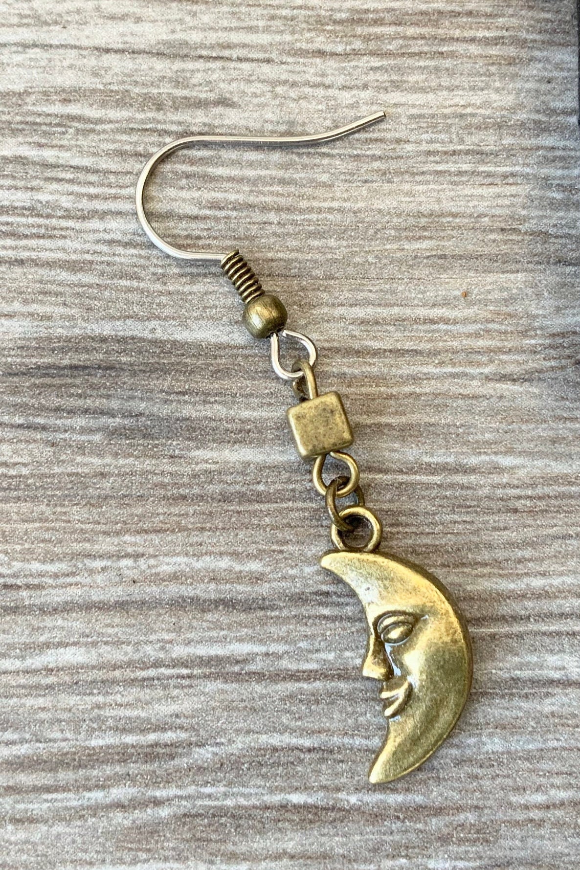 Moon dangle earring, available as a single earring or a pair of
