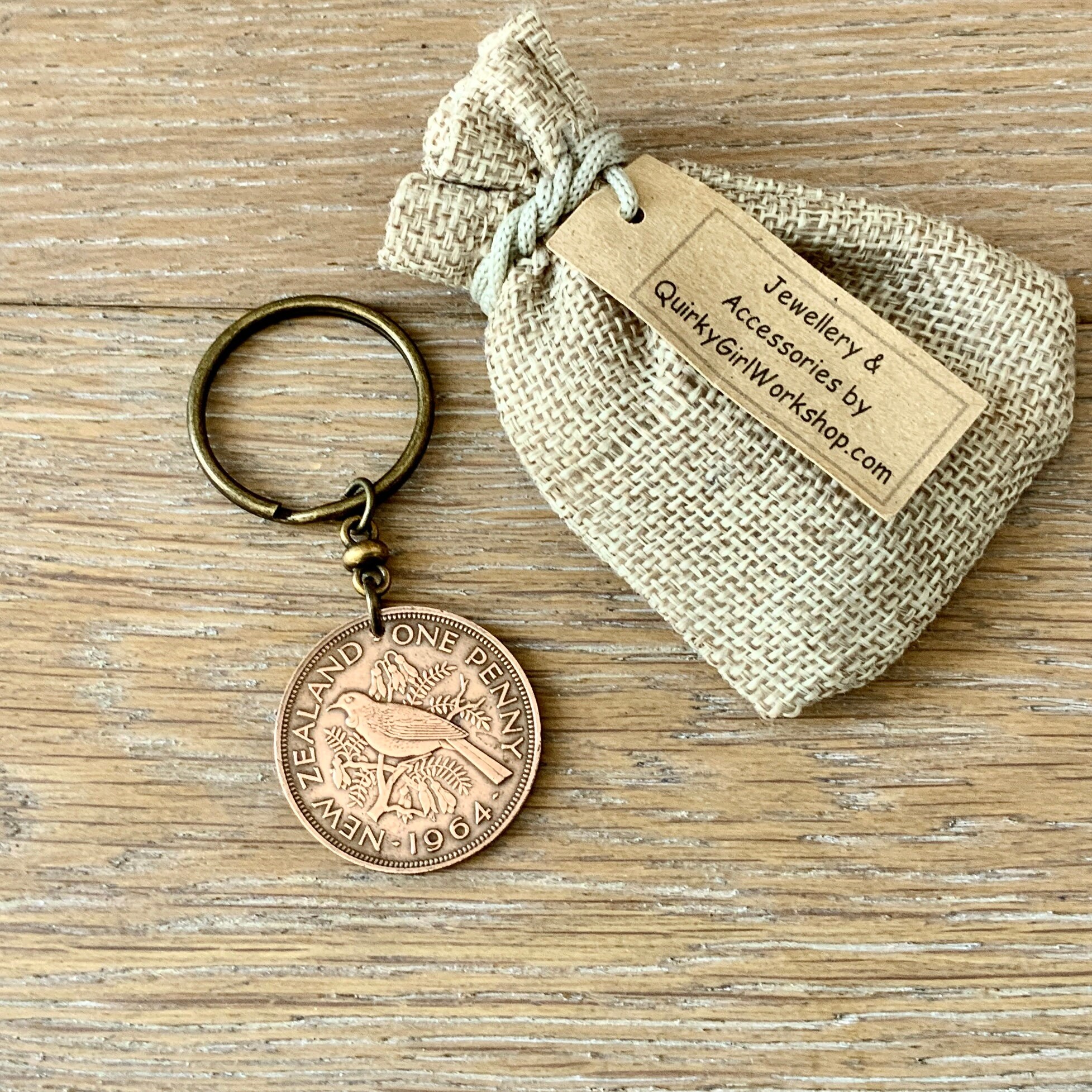 1964 New Zealand penny keyring, keychain, or clip, NZ Tui bird coin a