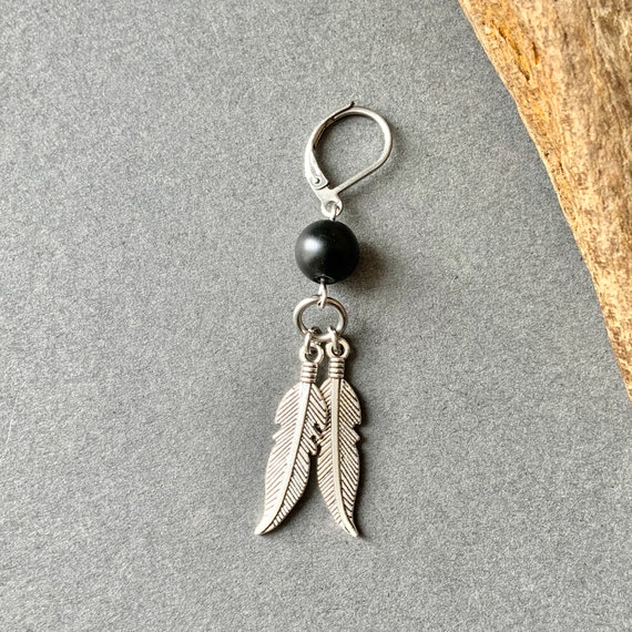 Feather dangle earring with a black onyx bead, available as a single earring or a pair earrings
