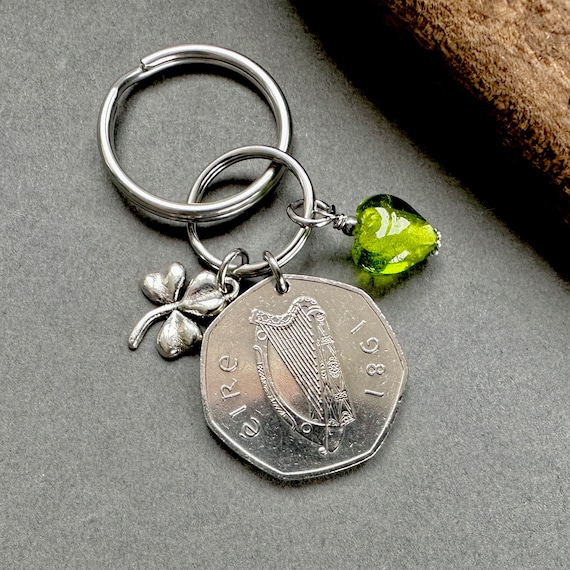 1981 Irish fifty pence coin keyring with a shamrock and a green glass heart charm