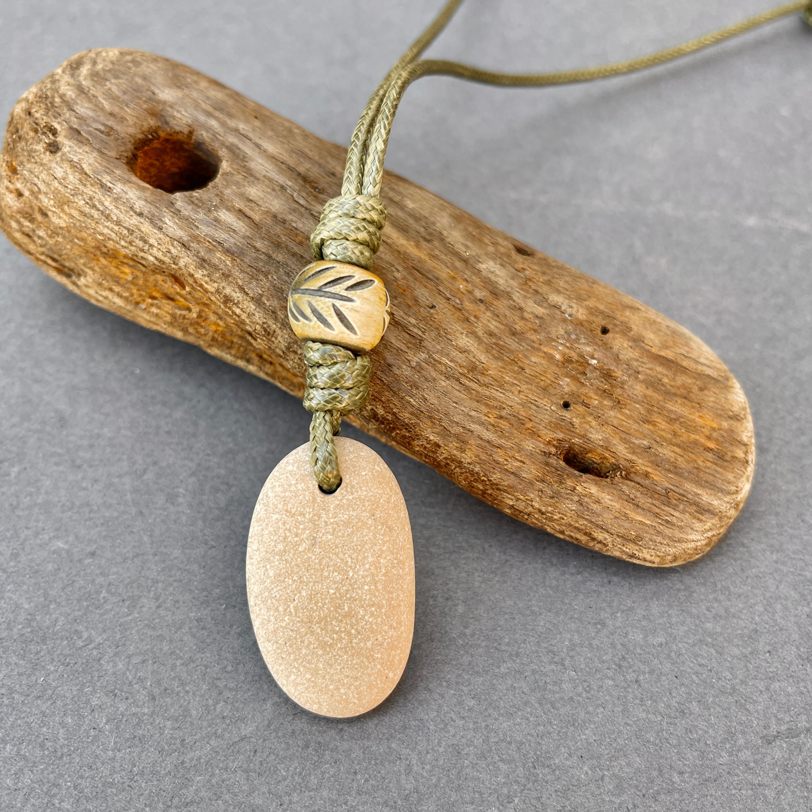 Beach pebble raw stone necklace rock jewellery green cord beige