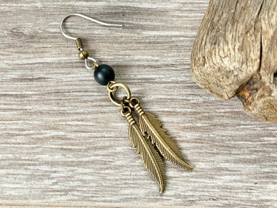 Double feather and onyx earring, available as a single earring or a pair of earrings,
