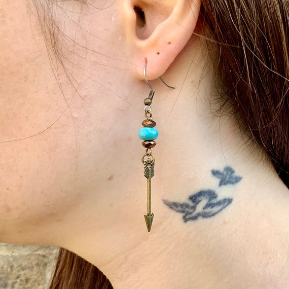 Bronze arrow earrings, available as a single earring or a pair of earrings
