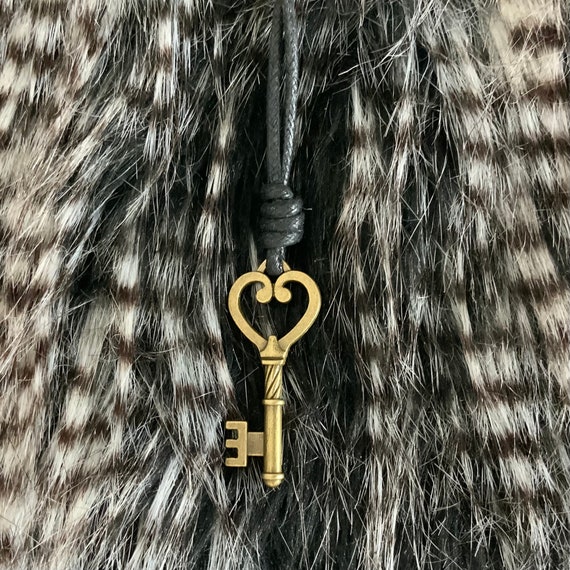 Bronze Skeleton key pendant necklace on an adjustable thick black cotton cord