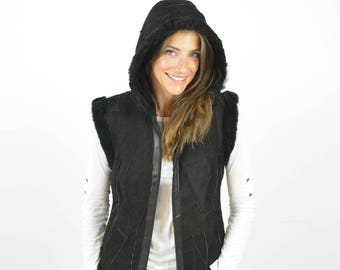 Black Sleeveless jacket for women with hoodie made of genuine sheepskin leather and fur inside. Handmade leather vest, great gift for her