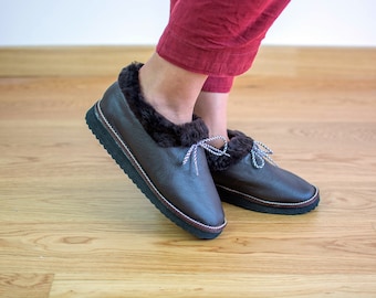 Womens slippers made with sheepskin leather and really soft fur inside. Really warm and totally handmade, a great gift for her