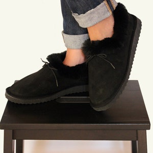 Womens slippers made with sheepskin suede black leather and really soft fur inside. Really warm and totally handmade, a great gift for her