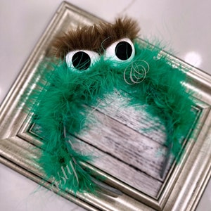 Personaje de disfraz de mascota de medusas verde azulado vestido
