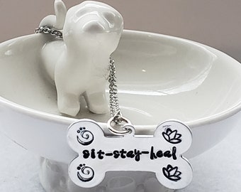 Dog lovers, meditation, "sit-stay-heal" hand stamped silver dog bone pendant and lotus flower on silver chain necklace