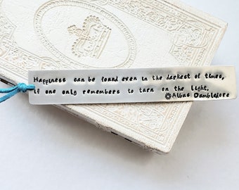 Bookmark "Happiness can be found even in the darkest of times..."Hand stamped sturdy aluminum bookmark suede leather, wizard inspired