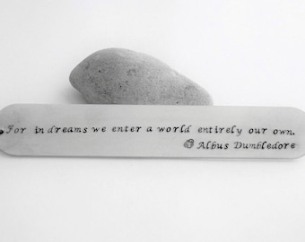 Bookmark "For in dreams we enter a world entirely our own." Hand stamped sturdy aluminum bookmark with suede leather, wizard inspired
