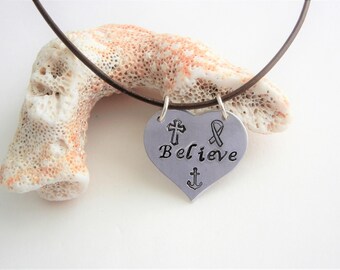 Believe heart pendant hand stamped on brown leather sterling silver lobster clasp necklace, faith, hope, inspiration, cancer ribbon