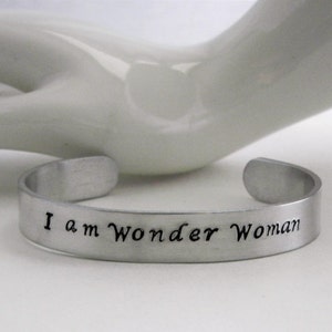 I am wonder woman...Hand stamped sturdy aluminum inspirational cuff bracelet, survivor, believe,stars,mother, daughter, sister,custom