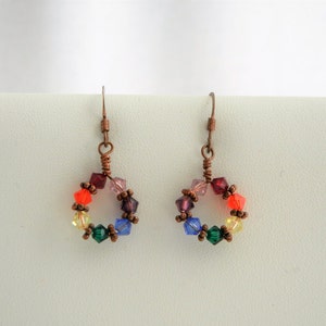 Balance your centers of energy: copper, swarovski crystal energy & balance wire wrapped chakra hoop earrings, yoga, meditation