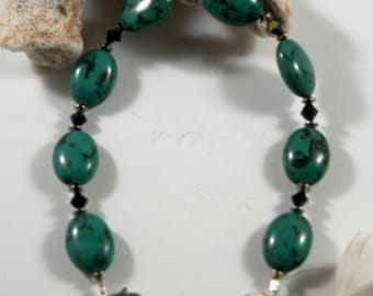 On Sale: Green turquoise, sterling silver and black swarovski crystal adjustable bracelet