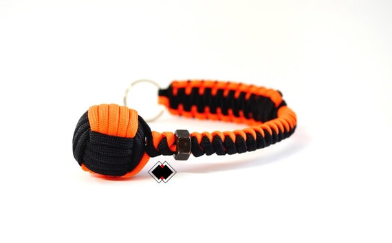 1" Monkey Fist keychain - black and neon orange - 550 Paracord - Handmade in USA