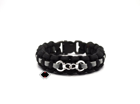 Correctional thin silver line - 550 paracord survival bracelet  - with handcuff charm - handmade