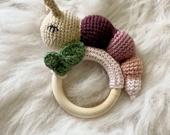 Crochet caterpillar baby rattle.