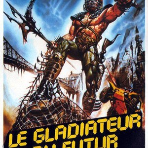 May include: A movie poster for the film "Le Gladiateur du Futur" featuring a futuristic warrior with a spiked weapon and a metal helmet. The poster has a black background with yellow text.