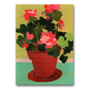 May include: A red terracotta pot with a green leafy plant and pink flowers. The pot is sitting on a green surface.
