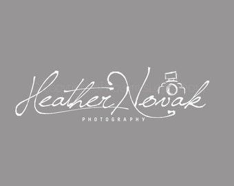 May include: White handwritten logo for Heather Nowak Photography with a stylised camera icon.