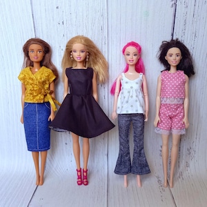 May include: Four dolls are presented, each wearing a different outfit. The dolls have varied skin tones and hairstyles. The outfits include a yellow wrap top and denim skirt, a black dress, a white floral top with flared jeans, and a pink polka-dot shorts set.