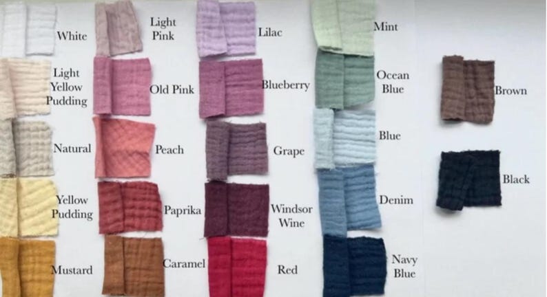 K&ouml;nnte beinhalten: Farbkarte mit 24 Stoffproben in verschiedenen Farben, darunter Wei&szlig;, Hellrosa, Lila, Mint, Altrosa, Heidelbeere, Ozeanblau, Braun, Pfirsich, Traube, Blau, Schwarz, Gelb, Paprika, Windsorwein, Karamell, Senf, Rot und Marineblau.