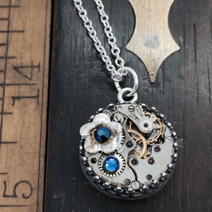 Birthstone steampunk necklace flower Swarovski crystal and watch movement. Handcrafted artistic jewelry -The Victorian Magpie