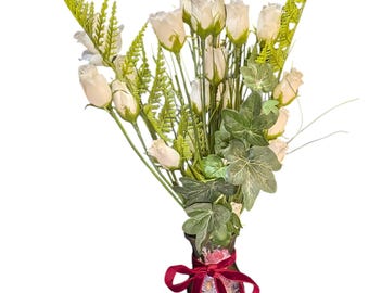 Dark green vase decorated with IOD transfers and ribbon.