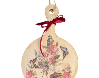 8 inch round by 12.5 inches tall decorative substantial cutting board.