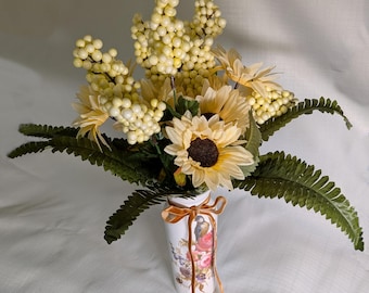 Beautifully decorated off white vase.