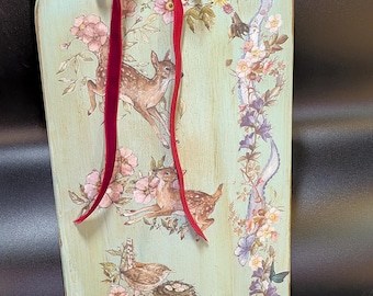 20.5 inches tall by approximately 7 inches wide decorative cutting board.