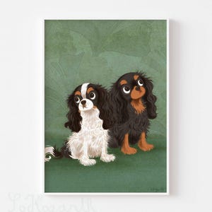 May include: Two Cavalier King Charles Spaniels, one black and tan and one white and black, are sitting on a green background. The dogs are looking up and have their tongues out.