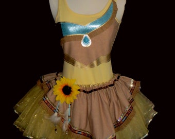 May include: A yellow and brown costume with a sunflower and feathers. The costume is a dress with a tulle skirt and a bodice with a brown and gold design.