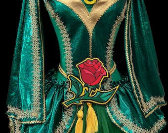 May include: A green and gold dress with a rose applique. The dress has a tulle skirt and a fitted bodice. The bodice is decorated with gold trim and a green gem.