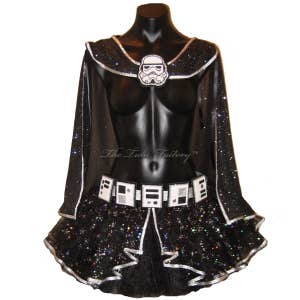 May include: Black and silver glitter tutu with a black cape and a white Stormtrooper helmet appliqué. The tutu has a silver trim and a black belt with white details. The text "The Tutu Factory™" is printed on the cape.