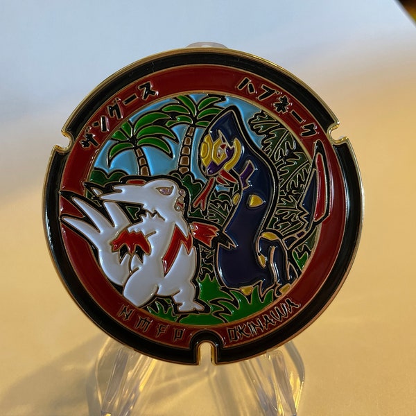 Zangoose Pokemon Manhole Challenge Coin - featuring the Okinawan Peace Park and the Second Class (E-5) rank - Okinawa Japan