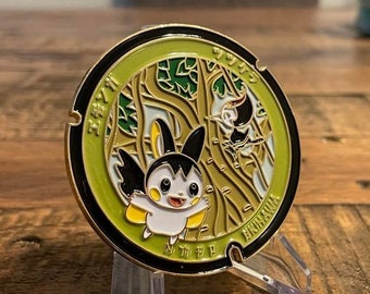 Emolga Pokemon Manhole Challenge Coin - featuring Nago Castle cherry blossoms and the Ensign (O-1) rank - Okinawa Japan