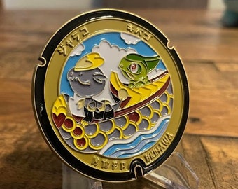 Axew and Jangmo-o Pokemon Manhole Challenge Coin - featuring Sabani Dragon Boats and the Lieutenant Commander (O-4) rank - Okinawa Japan