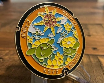 Solrock and Skiploom Pokemon Manhole Challenge Coin - featuring Urasoe Castle (Hacksaw Ridge) and the Lieutenant (O-3) rank - Okinawa Japan