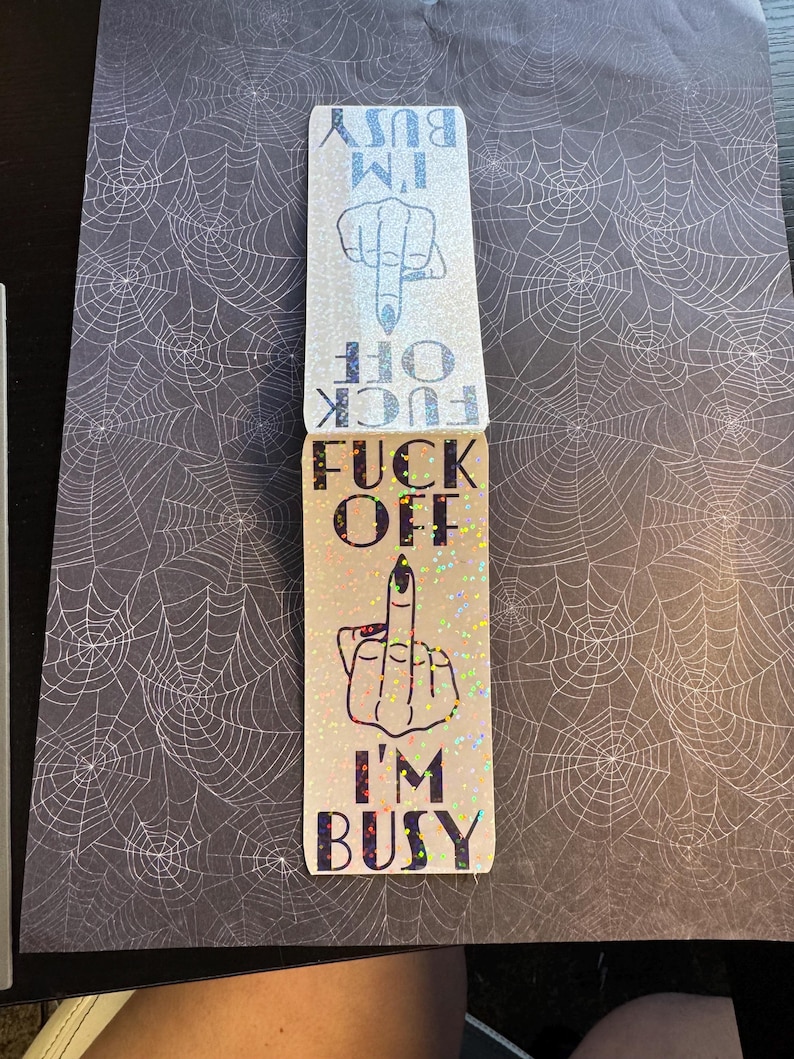 May include: A glittery sticker with a middle finger and the text "F**k Off I'm Busy".