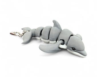 Articulated Dolphin with  Keychain option.