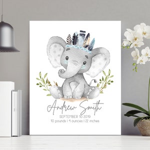 May include: A watercolor illustration of a gray elephant wearing a blue and white feather headdress. The elephant is sitting on a white background with green leaves. The text "Andrew Smith" is written below the elephant, along with the date "September 10, 2019" and the baby's weight and length: "10 pounds | 4 ounces | 22 inches".