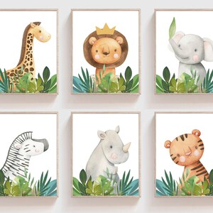 May include: Set of six watercolor illustrations featuring jungle animals, including a giraffe, lion, elephant, zebra, rhinoceros, and tiger. Each animal is depicted in a whimsical style with bright colors and surrounded by lush green foliage.