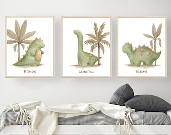 May include: Three watercolor illustrations of green dinosaurs with palm trees. The first dinosaur says "Be Strong", the second says "Stand Tall", and the third says "Be Brave".