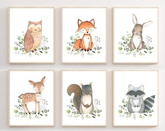 May include: Set of six watercolor illustrations featuring woodland animals, including an owl, fox, rabbit, deer, squirrel, and raccoon. Each animal is depicted in a whimsical style with a simple background of green leaves.