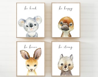 May include: Set of four watercolor prints featuring adorable animal illustrations with inspirational messages. The prints feature a koala, platypus, kangaroo, and wombat with the words "be kind", "be happy", "be brave", and "be strong" respectively.