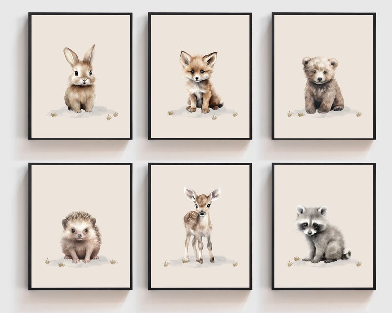 May include: Set of six watercolor illustrations featuring various baby animals, including a rabbit, fox, bear, hedgehog, deer, and raccoon. Each animal is depicted in a cute and whimsical style, sitting on a light brown background.