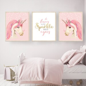 May include: Three pink and white unicorn illustrations with gold glitter accents. The centre illustration features the text "She leaves a little sparkle wherever she goes".